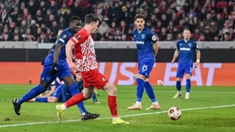 Freiburg’s Michael Gregoritsch, centre left, scores the opening goal during the Europa League round of 16 first leg soccer match between SC Freiburg West Ham United at the Europa-Park Stadion in Freiburg, Germany, Thursday, March 7, 2024. (Harry Langer...