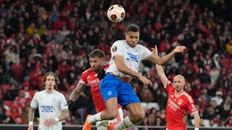 Rangers’ Cyriel Dessers, top, tries to score with a header challenged by Benfica’s Nicolas Otamendi during the Europa League round of 16, first leg, soccer match between SL Benfica and Rangers FC at the Luz stadium in Lisbon, Thursday, March 7, 2024. (...
