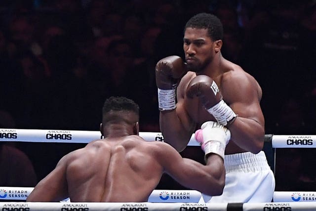 British former world champion Anthony Joshua triumphed after two rounds of his Saudi showdown with MMA fighter Francis Ngannou 