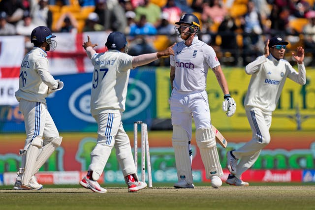 England captain Ben Stokes, second right, reacts after being bowled out by India’s Ravichandran Ashwin