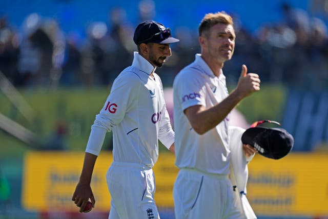 James Anderson, right, took his 700th Test wicket on Saturday (Ashwini Bhatia/AP)