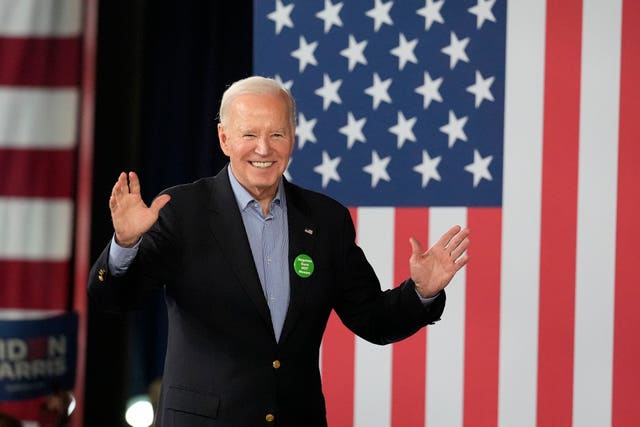 President Joe Biden waves to supporters after speaking at a campaign event in Atlanta