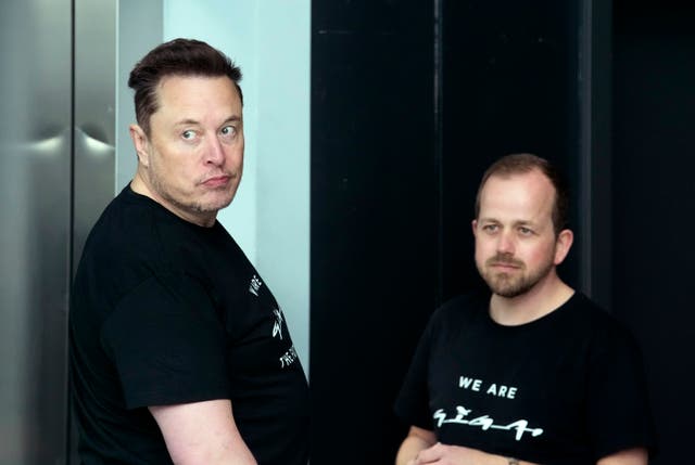 Elon Musk and factory manager