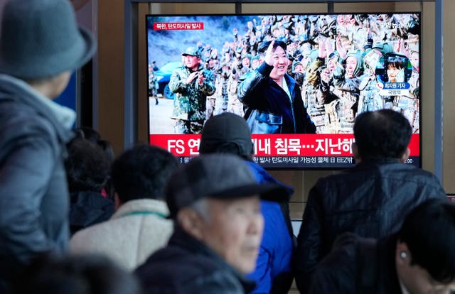 A TV screen shows a file image of North Korean leader Kim Jong Un during a news program at the Seoul Railway Station in Seoul, South Korea (Ahn Young-joon/AP)