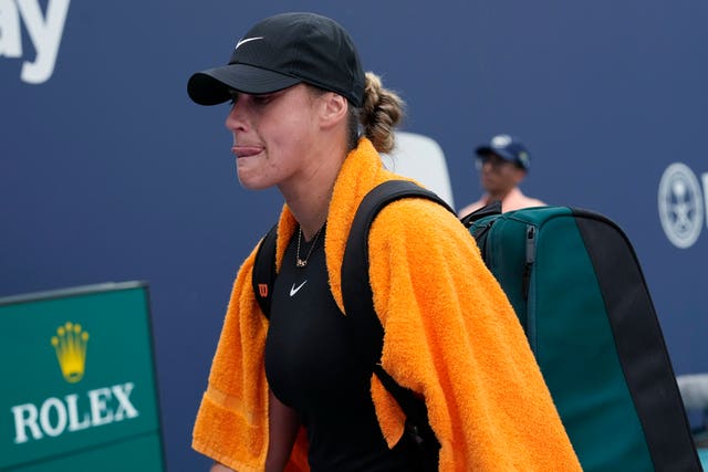 Aryna Sabalenka walks off the court after winning her match 