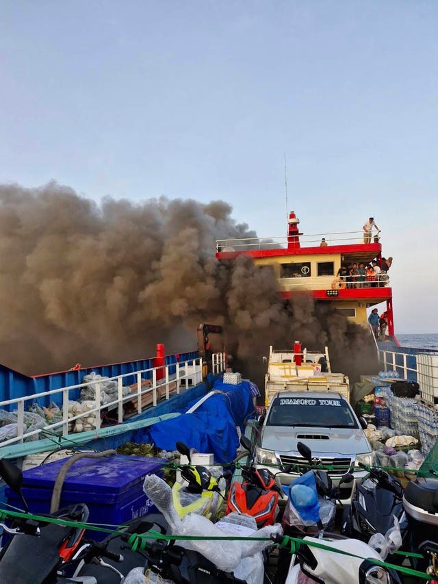 Smoke rises from a ferry in Surat Thani province, Thailand