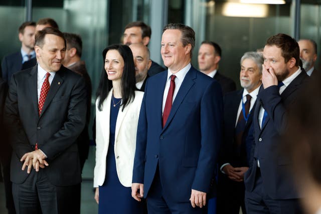 From left, Poland’s foreign minister Radoslaw Sikorski, Bulgaria’s foreign minister Mariya Gabriel, British Foreign Secretary David Cameron and Estonia’s freign minister Margus Tsahkna attend a ceremony to mark the 75th anniversary of Nato at Nato headquarters in Brussels