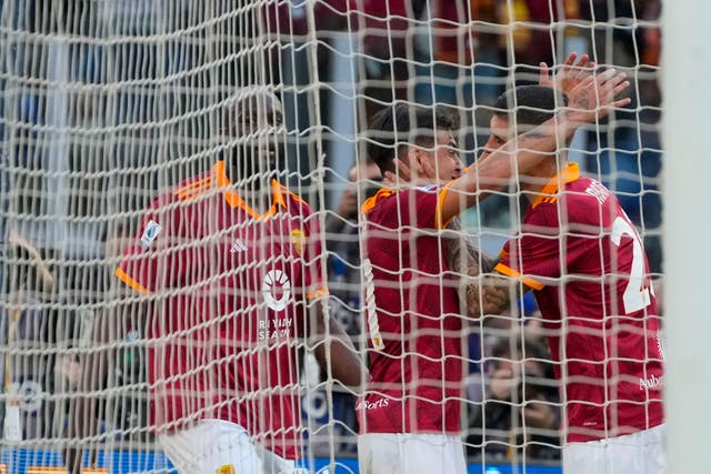 Roma’s Gianluca Mancini (right) celebrates his derby goal against Lazio