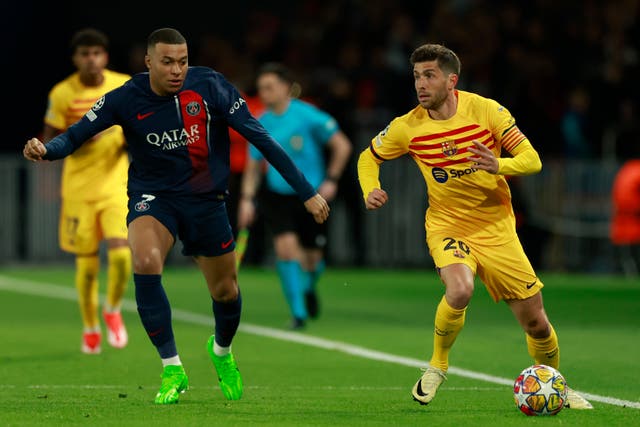 Barcelona’s Sergi Roberto, right, received a costly booking in the first leg against Paris St Germain