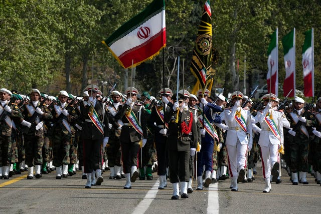 Iranian army members march during an Army Day parade at a military base in northern Tehran 