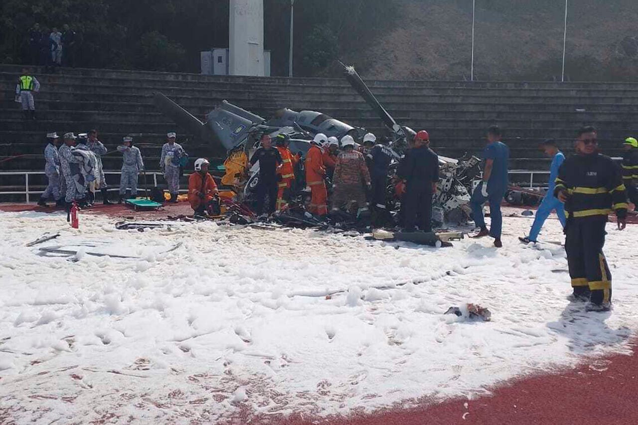 Two Malaysian military helicopters collide and crash, killing 10 people
