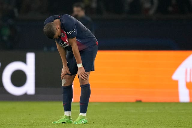 Mbappe cut a dejected figure after PSG were knocked out of the Champions League by Borussia Dortmund this week 
