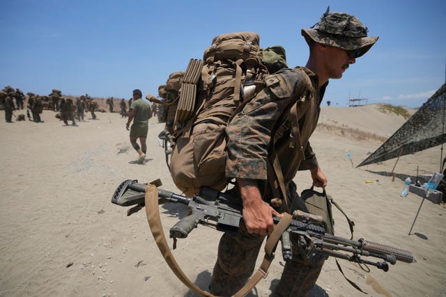 A US trooper in battle during the joint military exercise