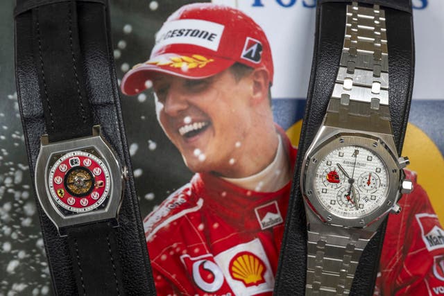 Two watches belonging to Michael Schumacher are on display: F.P., left, Journe, Invenit et Fecit, piece Unique, Vagabondage 1 Model, it is estimated to sell between 1,200,000 to 2,300,000 US dollars and Audemars Piguet, right, Royal OAK Chronograph model, it is estimated to sell between 180,000 to 280,000 US dollars 