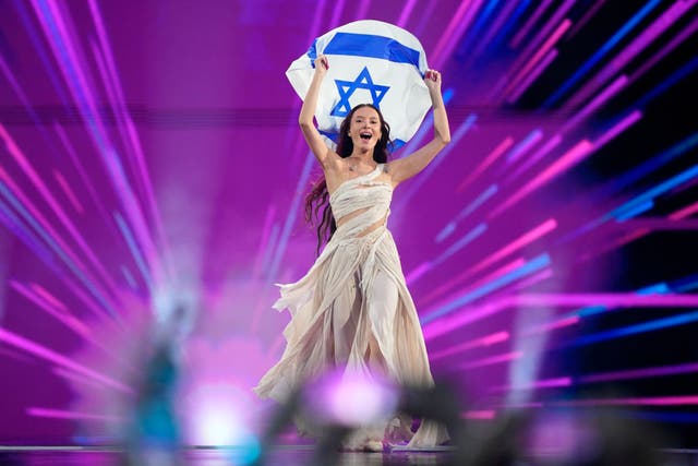 Eden Golan of Israel enters the arena during the flag parade before the grand final of the Eurovision Song Contest in Malmo 
