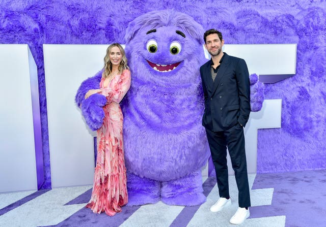 Emily Blunt and John Krasinski pose with the character Blue at the premiere of Paramount Pictures’ IF at the SVA Theatre in May in New York 