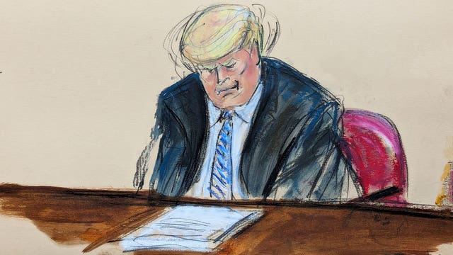 Former president Donald Trump reacts as Michael Cohen testifies that he told Mr Trump that the Stormy Daniels story was not contained 