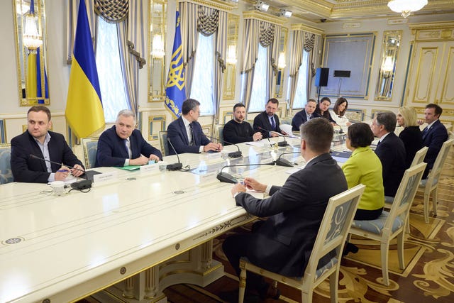 Ukraine’s President Volodymyr Zelensky, fourth left, speaks during a meeting with US secretary of state Antony Blinken, third right, in Kyiv, Ukraine