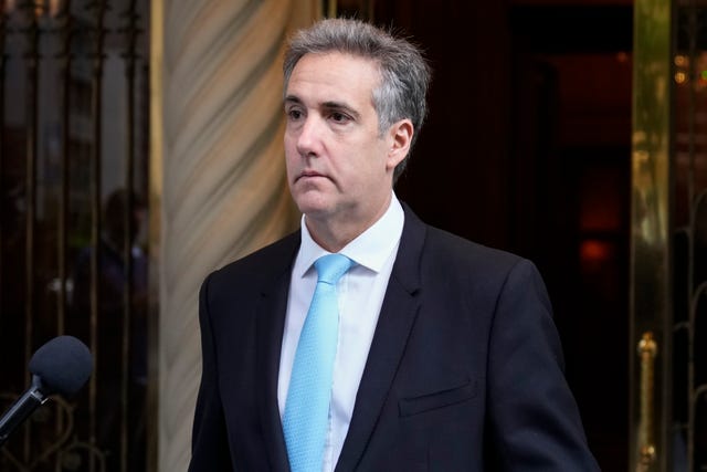 Michael Cohen leaves his apartment building on his way to Manhattan criminal court in New York