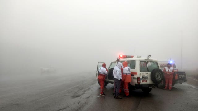 Rescue teams near the site of the incident of the helicopter carrying Iranian President Ebrahim Raisi in Varzaghan in north-western Iran 