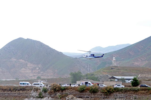 In this photo provided by Islamic Republic News Agency (IRNA), the helicopter carrying Iranian President Ebrahim Raisi takes off at the Iranian border with Azerbaijan after President Raisi and his Azeri counterpart Ilham Aliyev inaugurated dam of Qiz Qalasi, or Castel of Girl in Azeri, Iran