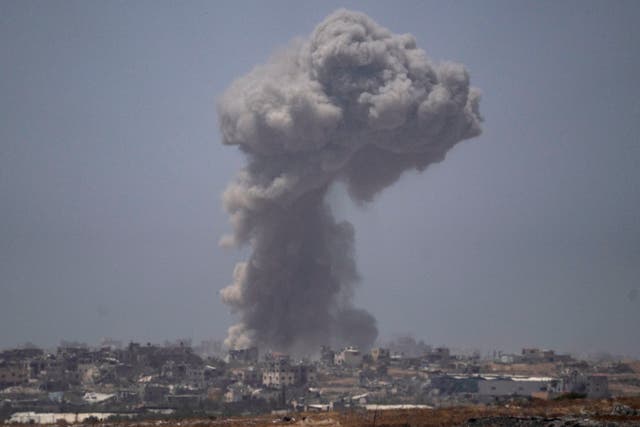 Smoke billows after an explosion in the Gaza Strip, as seen from southern Israel