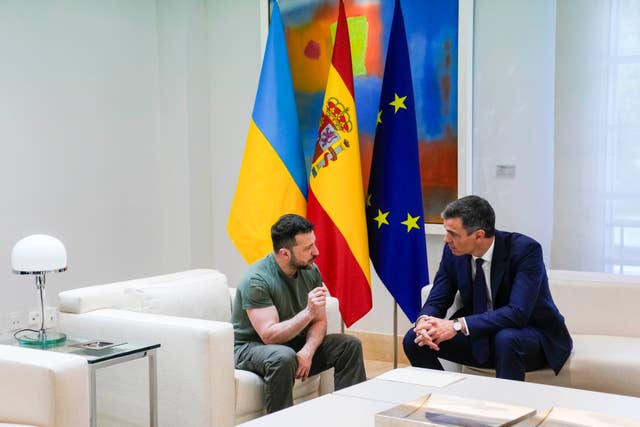 Mr Zelenskyy, left, talks with Mr Sanchez in Madrid