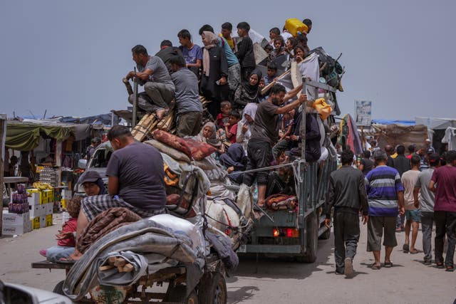 Palestinians fleeing from the southern Gaza city of Rafah during an Israeli ground and air offensive in the city