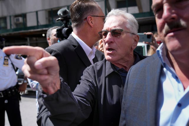 Robert De Niro argues with a Donald Trump supporter after speaking to reporters in support of President Joe Biden across the street from Trump’s criminal trial in New York