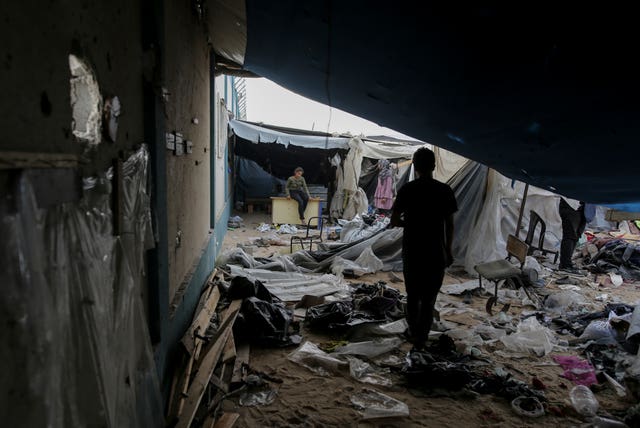Palestinians inspect tents destroyed by Israel’s bombardment 