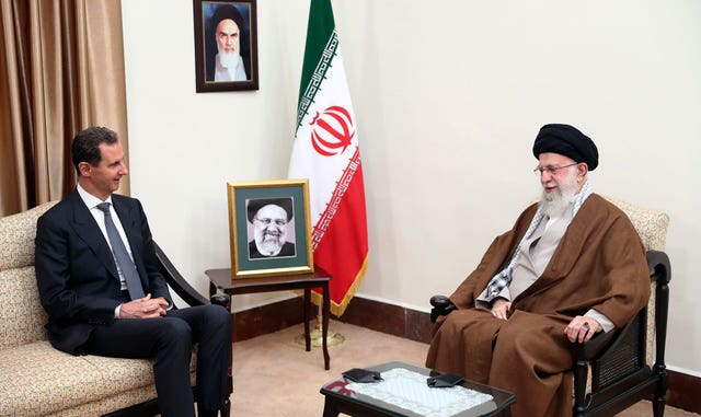 Bashar Assad and Ayatollah Ali Khamenei, both seated