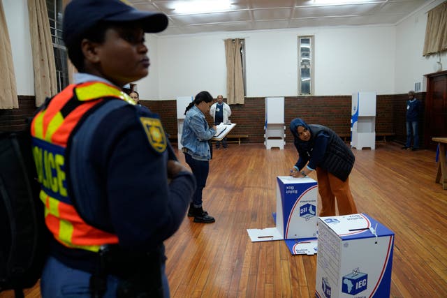 A voting official prepares a voting box at a polling station in Cape Town, South Africa 
