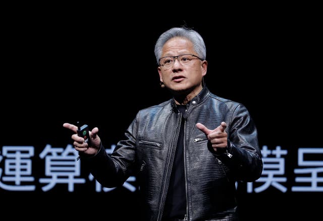 Nvidia chief executive Jensen Huang speaks at an exhibition 