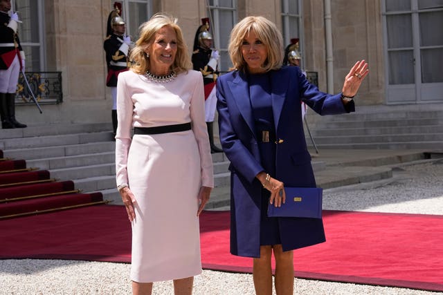 Jill Biden and Brigitte Macron greet the crowds in Paris