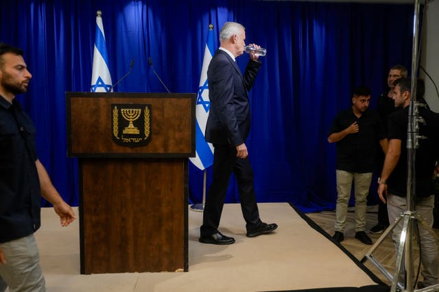 Benny Gantz, a centrist member of Israel’s three-member war cabinet, drinks as he leaves after announcing his resignation in Ramat Gan, Israel