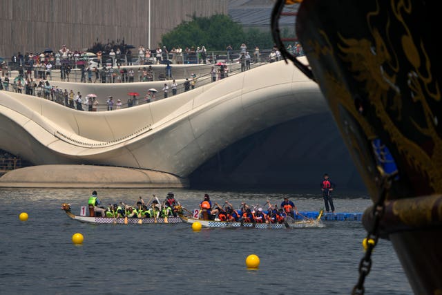 A flotilla at a spectacular bridge near Beijing