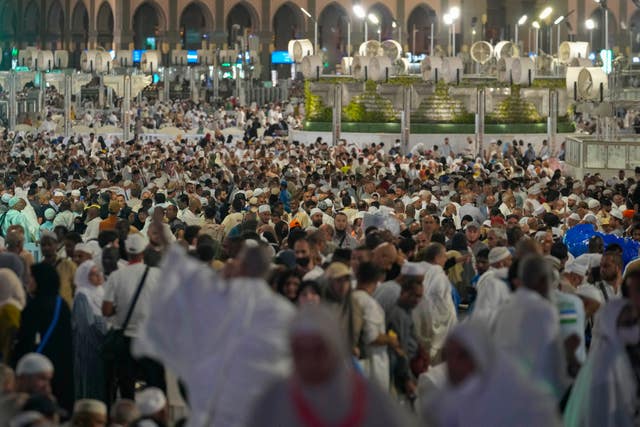 Pilgrims pray at the Grand Mosque