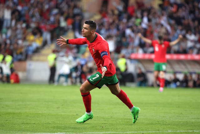 Cristiano Ronaldo wheels away in delight after scoring for Portugal against Republic of Ireland 