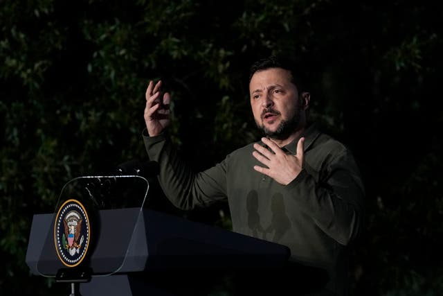 Ukraine’s President Volodymyr Zelensky talks to journalists during a news conference after signing a bilateral security agreement with US President Joe Biden during the sidelines of the G7 summit at Savelletri, Italy 