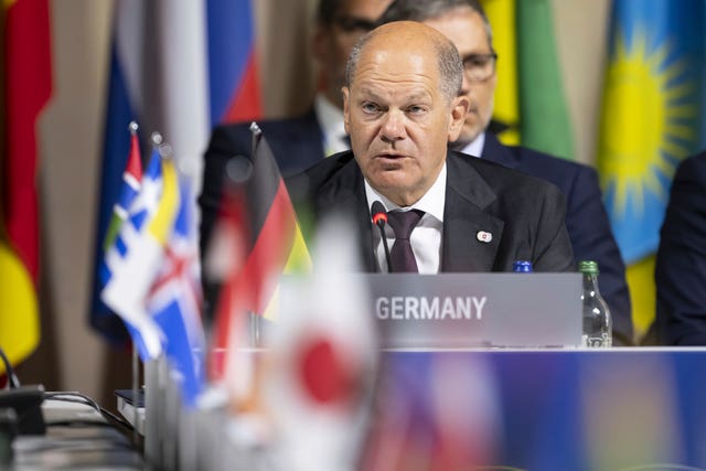 Germany’s Chancellor Olaf Scholz speaks during the opening plenary session of the Summit on Peace in Ukraine, in Obburgen, Switzerland