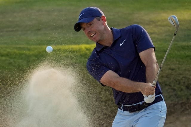 Rory McIlroy hits out of a bunker