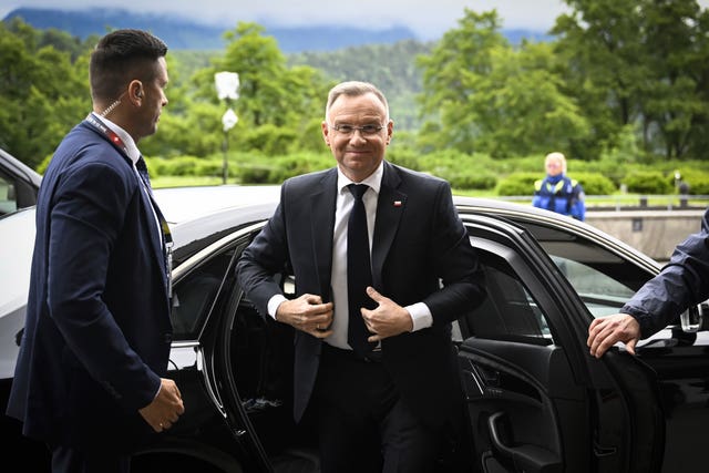Andrzej Duda, President of Poland, gets out of a car at the summit 