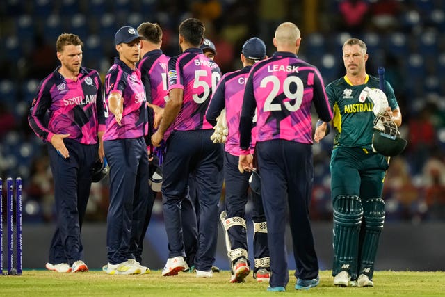 Scotland's defeat to Australia later sealed England's place in the next stage of the T20 World Cup