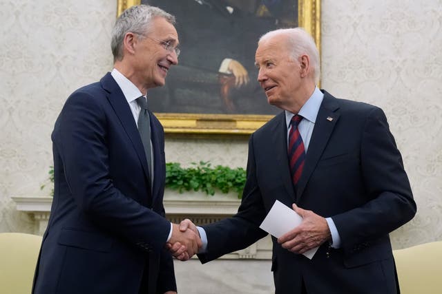 US President Joe Biden shakes hands with Nato secretary-general Jens Stoltenberg in the Oval Office at the White House