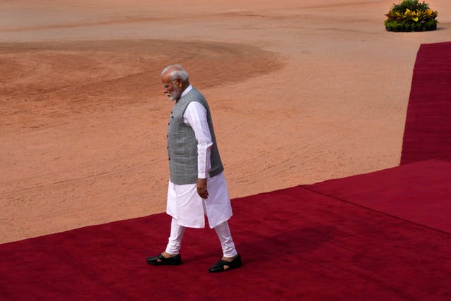 Narendra Modi on a red carpet
