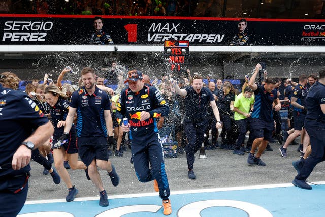 Max Verstappen celebrates with Red Bull team members after winning the Spanish Grand Prix