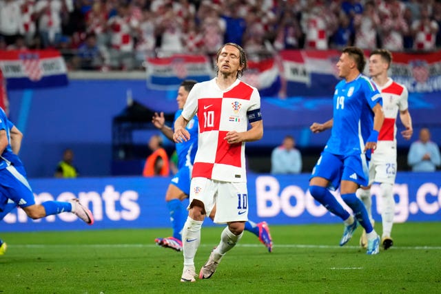 Croatia’s Luka Modric reacts after missing a penalty against Italy