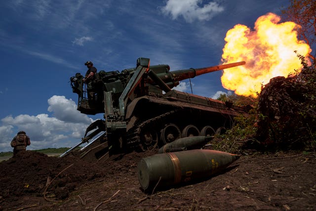 Ukrainian soldiers fire on Russian positions along the front line 
