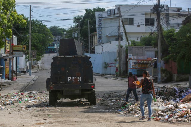 An armoured police vehicle patrols in Port-au-Prince, 