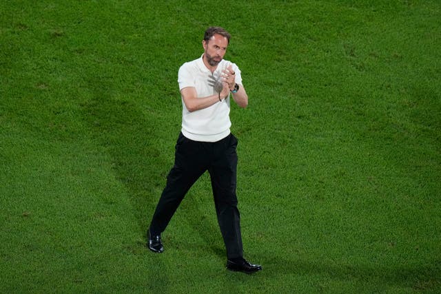 England coach Gareth Southgate applauds on the pitch after the draw with Slovenia